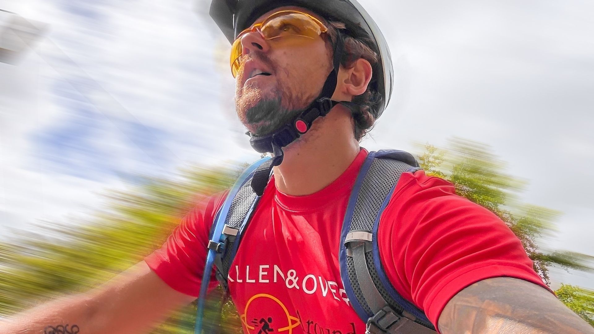 A male cyclist participating in the Allen and Overy round the world challenge