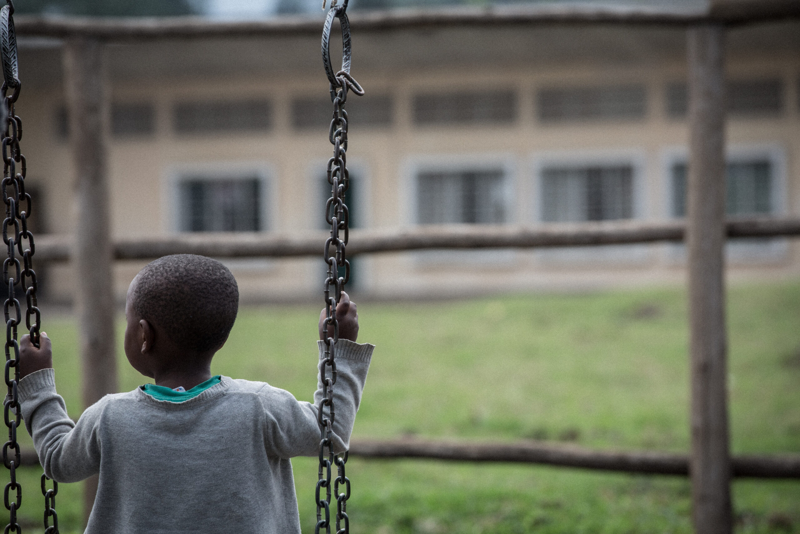 A child on a swing in Noel Nyundo orphanages, Rwanda, closed by Hope and Homes for Children in April 2015