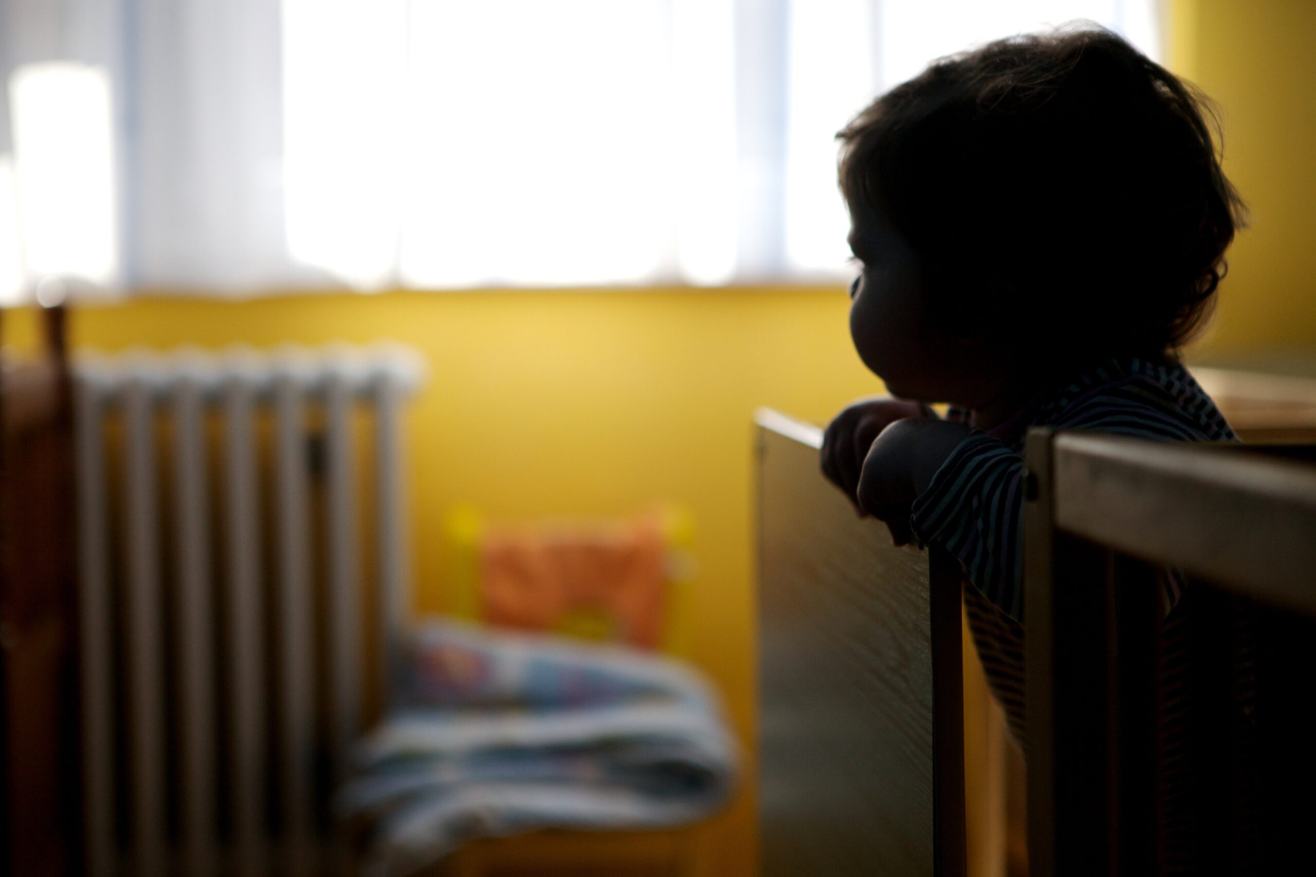 Silhouette of a child in Dom-Porodica Childrens home in Zenici, Bosnia and Herzegovina.