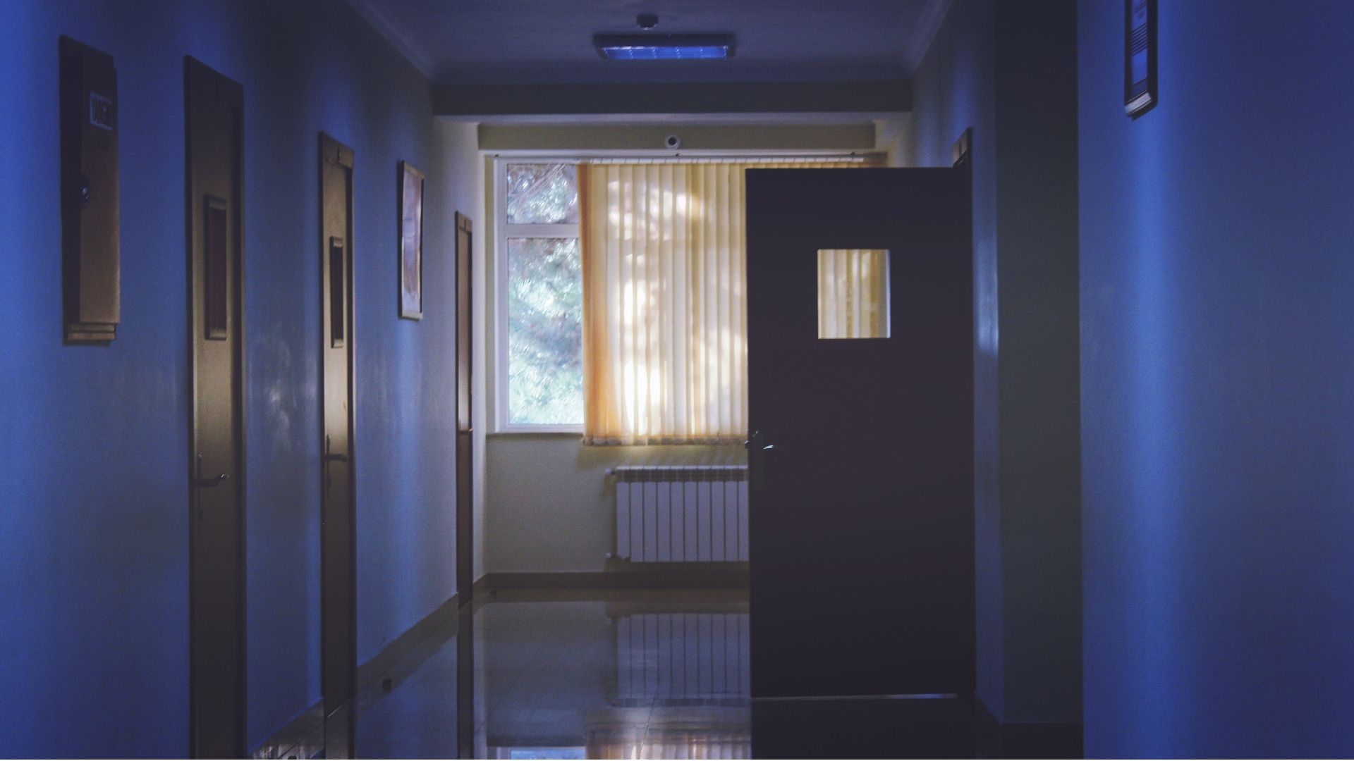 A darkened hospital corridor