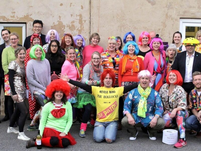 People dressed in fancy dress for a Hope and Homes fundraiser