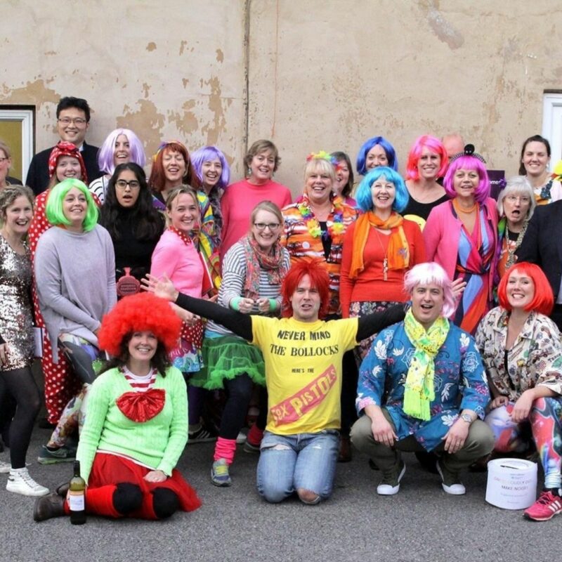 People dressed in fancy dress for a Hope and Homes fundraiser