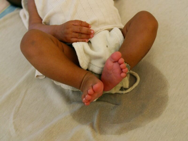 A child in a baby home in Sudan, a country which is very vulnerable to climate change