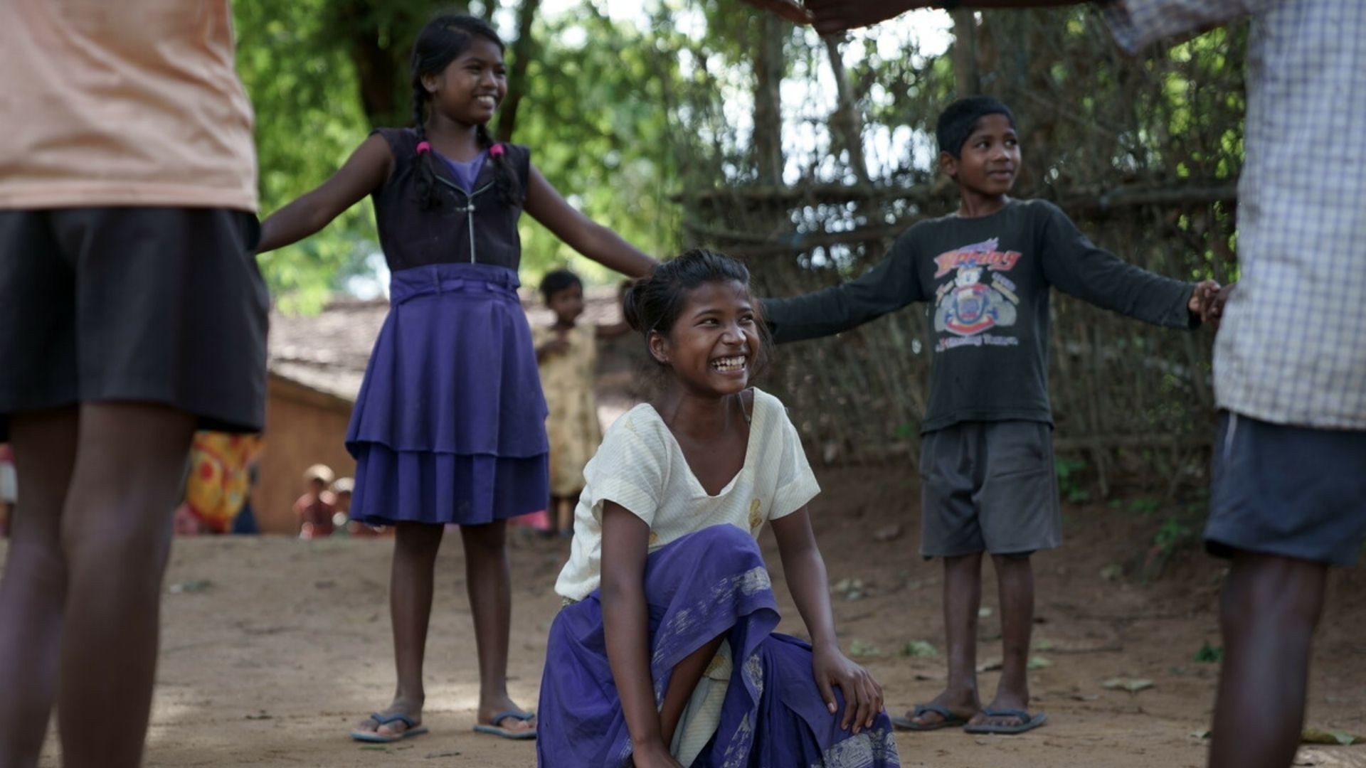 Sonia and her friends playing in their village