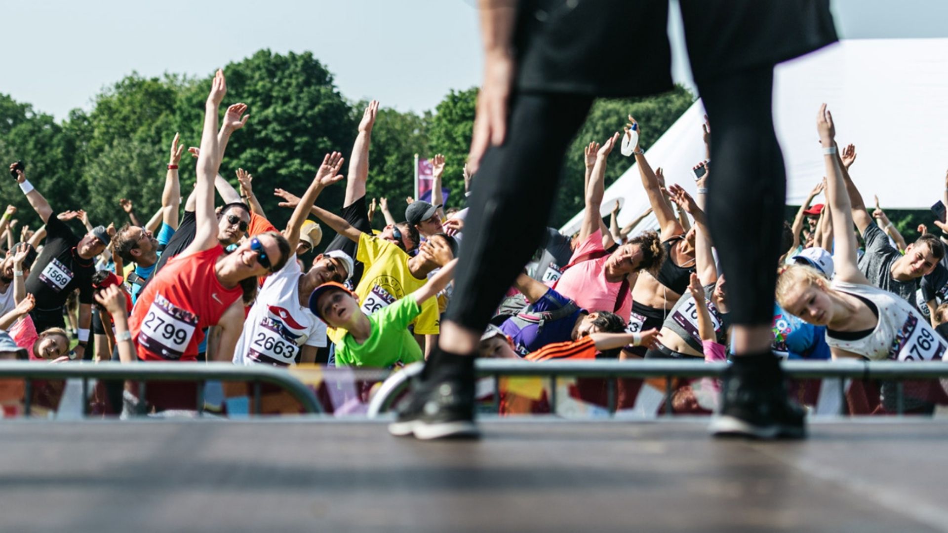 A persons feet on a stage at a music event