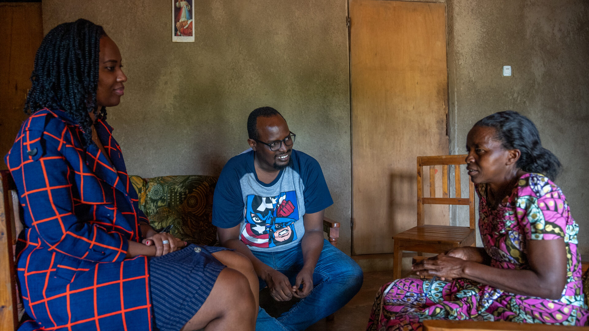 Child psychologists meet with prospective foster parents in their home in Rwanda