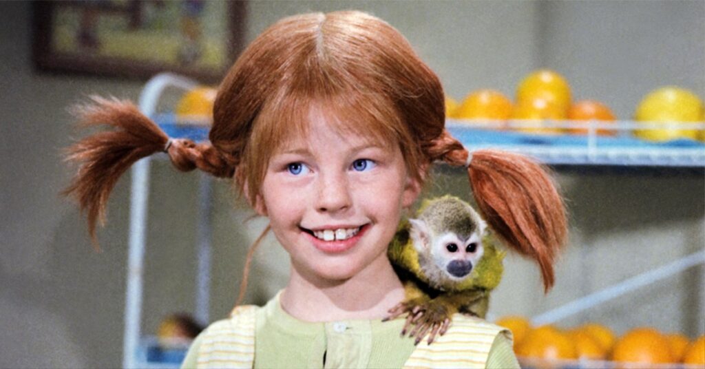 An image from the Swedish film, Pippi Longstocking, showing Pippi with her monkey, Mr Nilsson, sitting on her shoulder