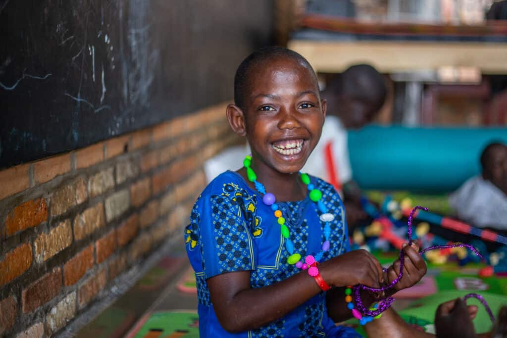 Image is of a young child smiling