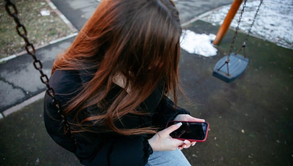 Image: Daryna checks her phone