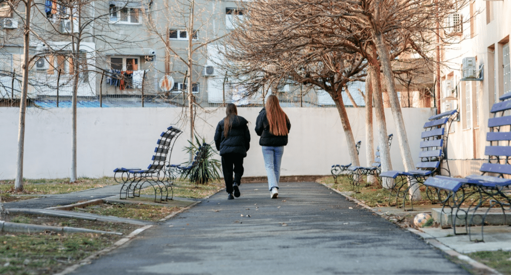 Image: Daryna and her friend in the emergency child protection centre, a former orphanage in Bucharest. 
