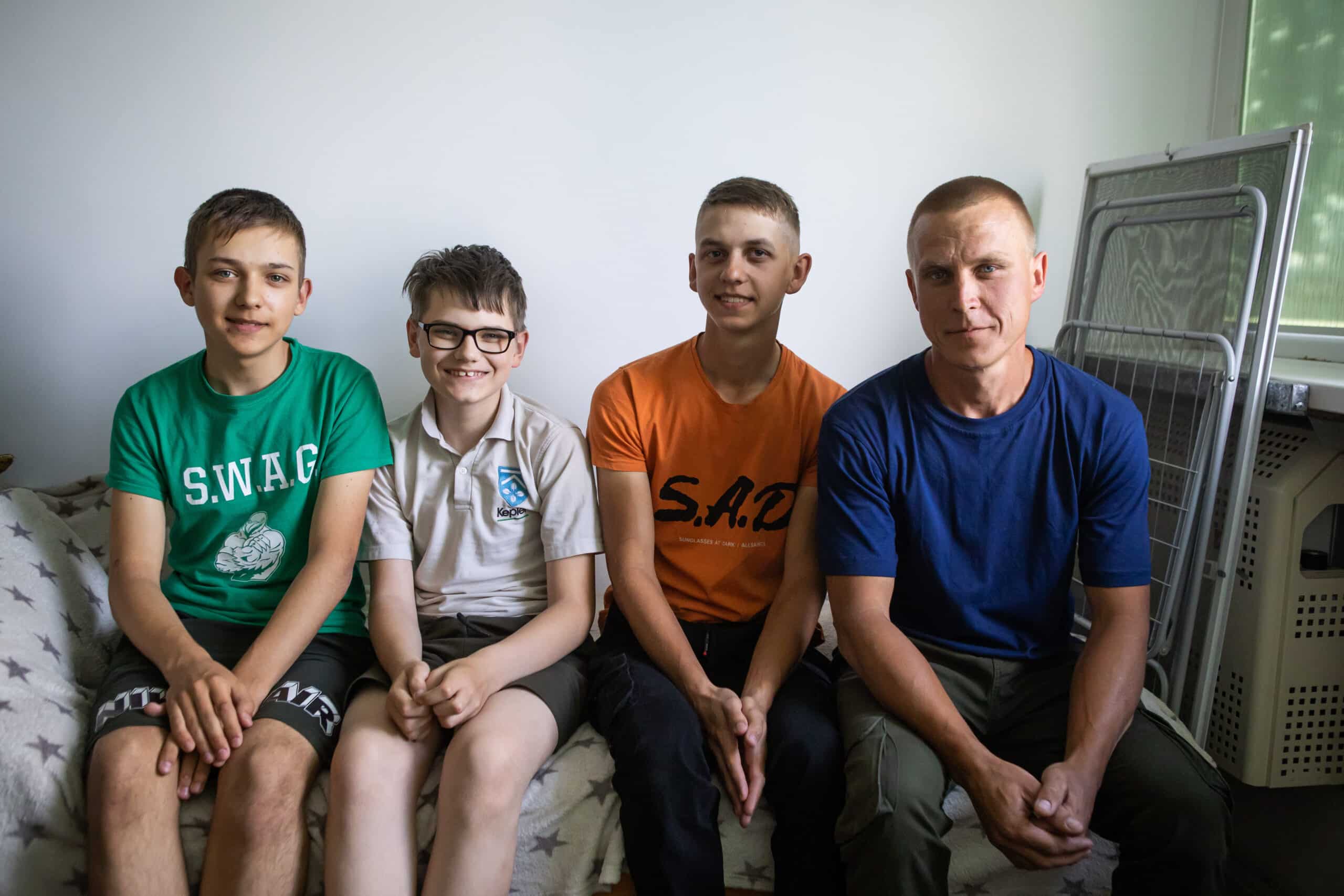 Kyrylo* adopted his nephews after their home was destroyed by Russian troops. Now, we're supporting him to keep his family together.